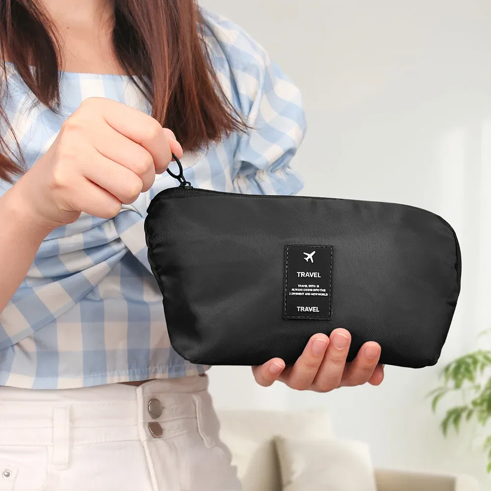 Rangement de valise avec pochettes de séparation