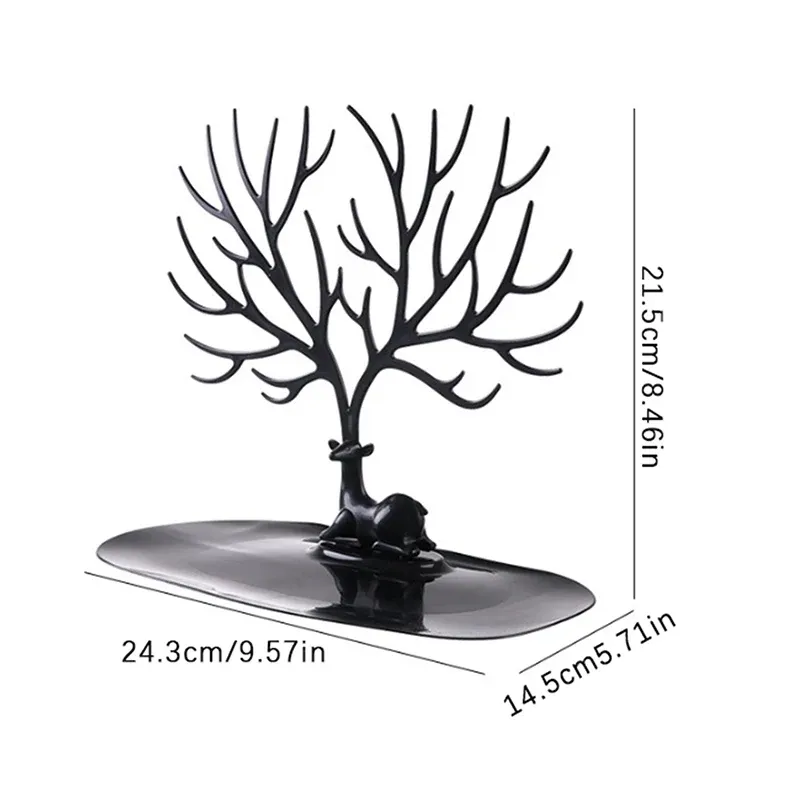 Présentoir à bijoux en forme de branche d'arbre sur coiffeuse