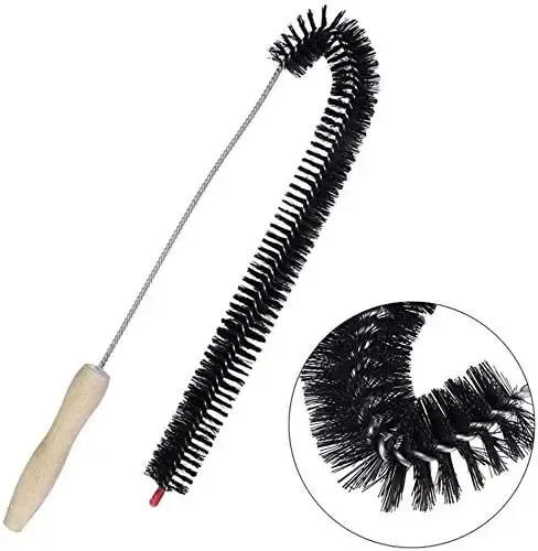 Brosse de nettoyage utilisée sur un radiateur