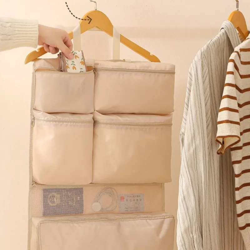 Organisateur de voyage suspendu, pliable et portable, à poches multiples pour vêtements et accessoires 2