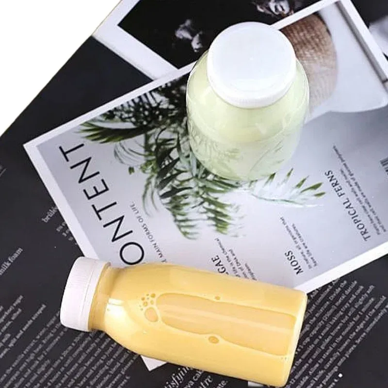 Bouteilles de jus transparentes