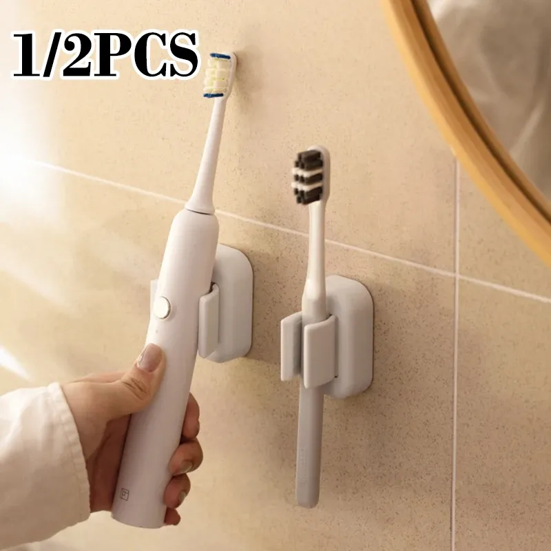Porte-brosse à dents mural auto-adhésif, clip pour balai, support de rangement polyvalent, gain de place, organisateur de salle de bain, lot de 1/2 - Image 1