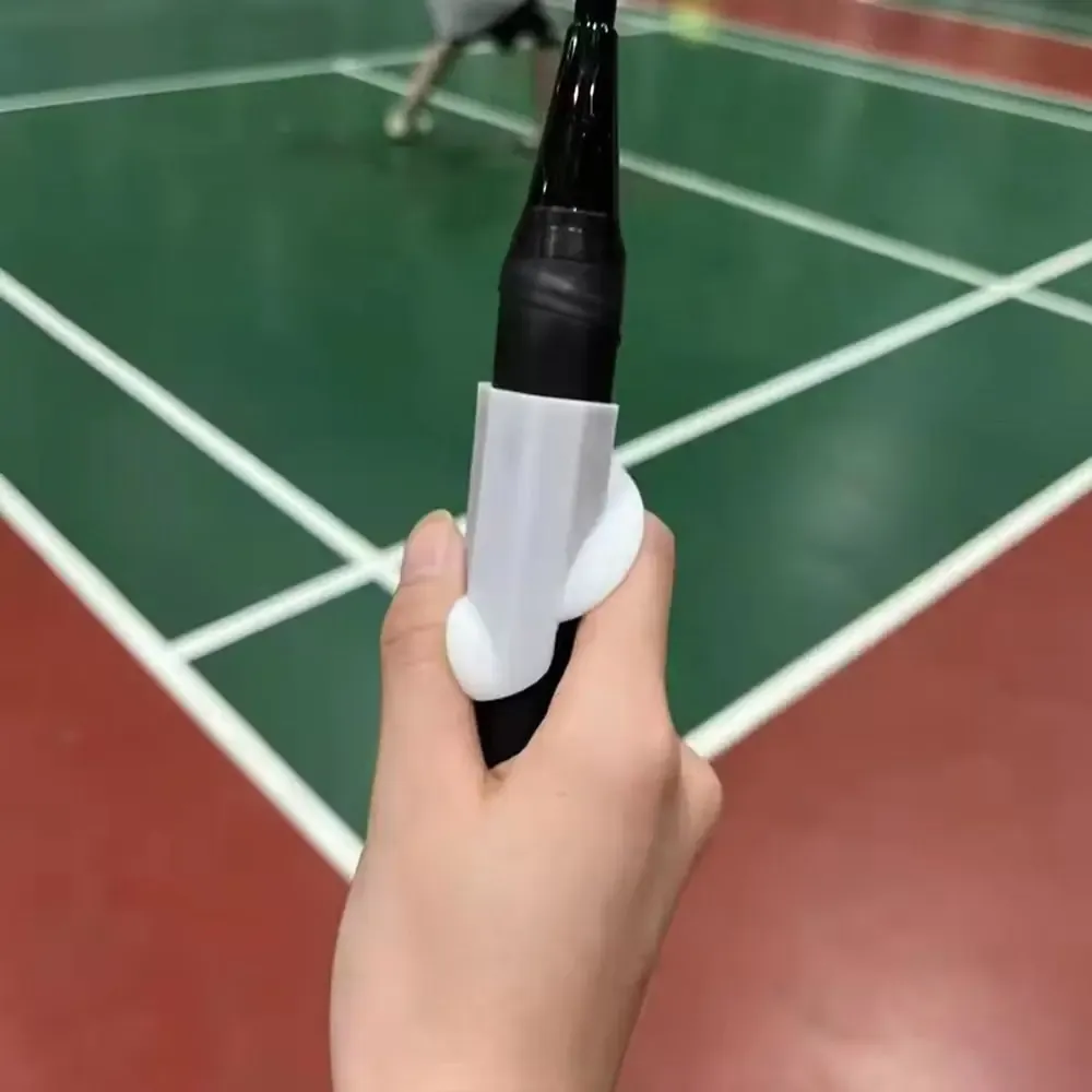 Aide à la prise de raquette en situation d'entraînement