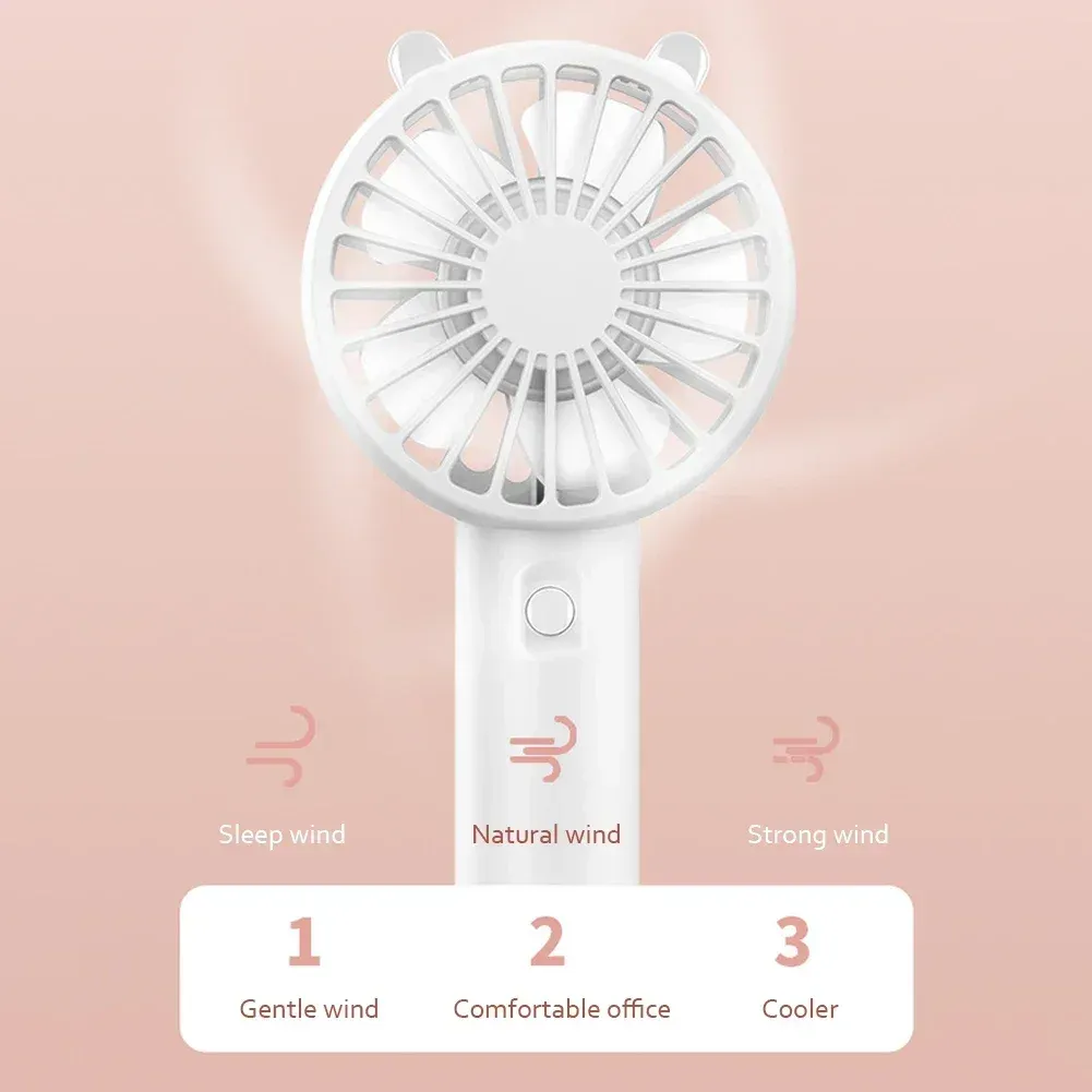 Mini ventilateur portatif en situation d'utilisation