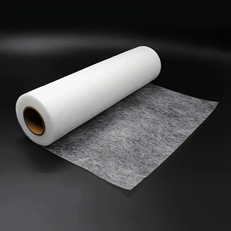 Application du ruban thermocollant sur un vêtement