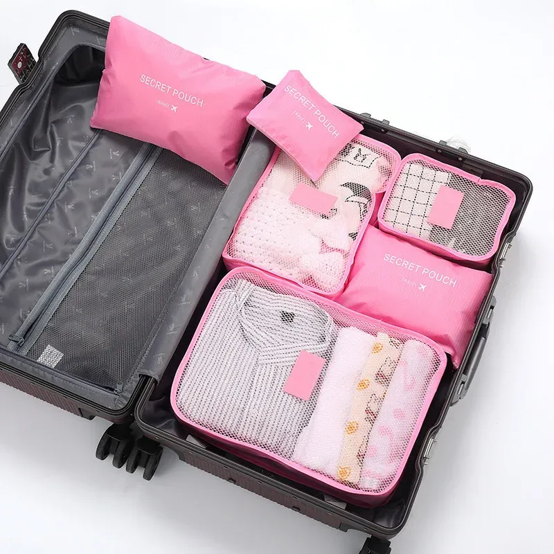 Ensemble de 6 sacs de rangement pour vêtements de voyage, organiseur de bagages portable, cubes de rangement pour valise, chaussures et vêtements, pochette portable

Wait, that's already in French. Here is a cleaned-up version without the keyword stuffing:

Ensemble de 6 organisateurs de voyage pour valise 11