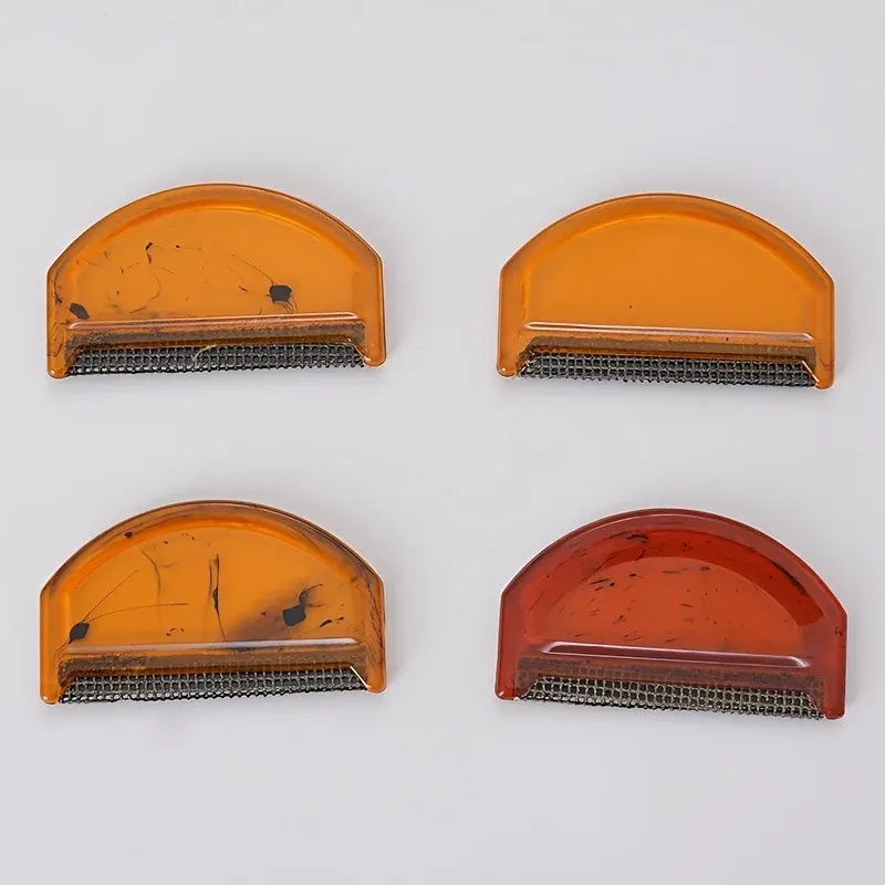 Détail de la tête de brosse ambre
