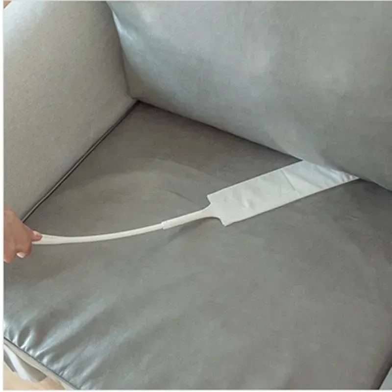 Brosse anti-poussière en situation d'utilisation domestique