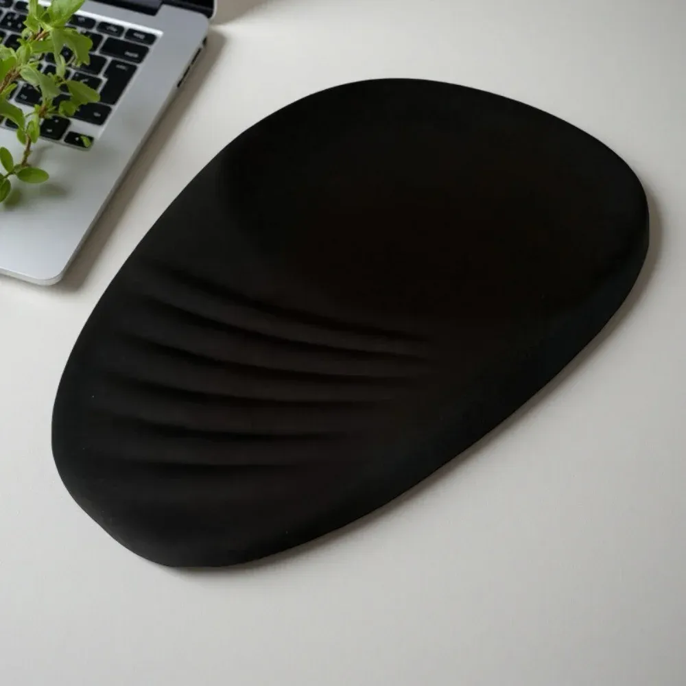 Tapis de souris ergonomique, détail de la surface de repos du poignet