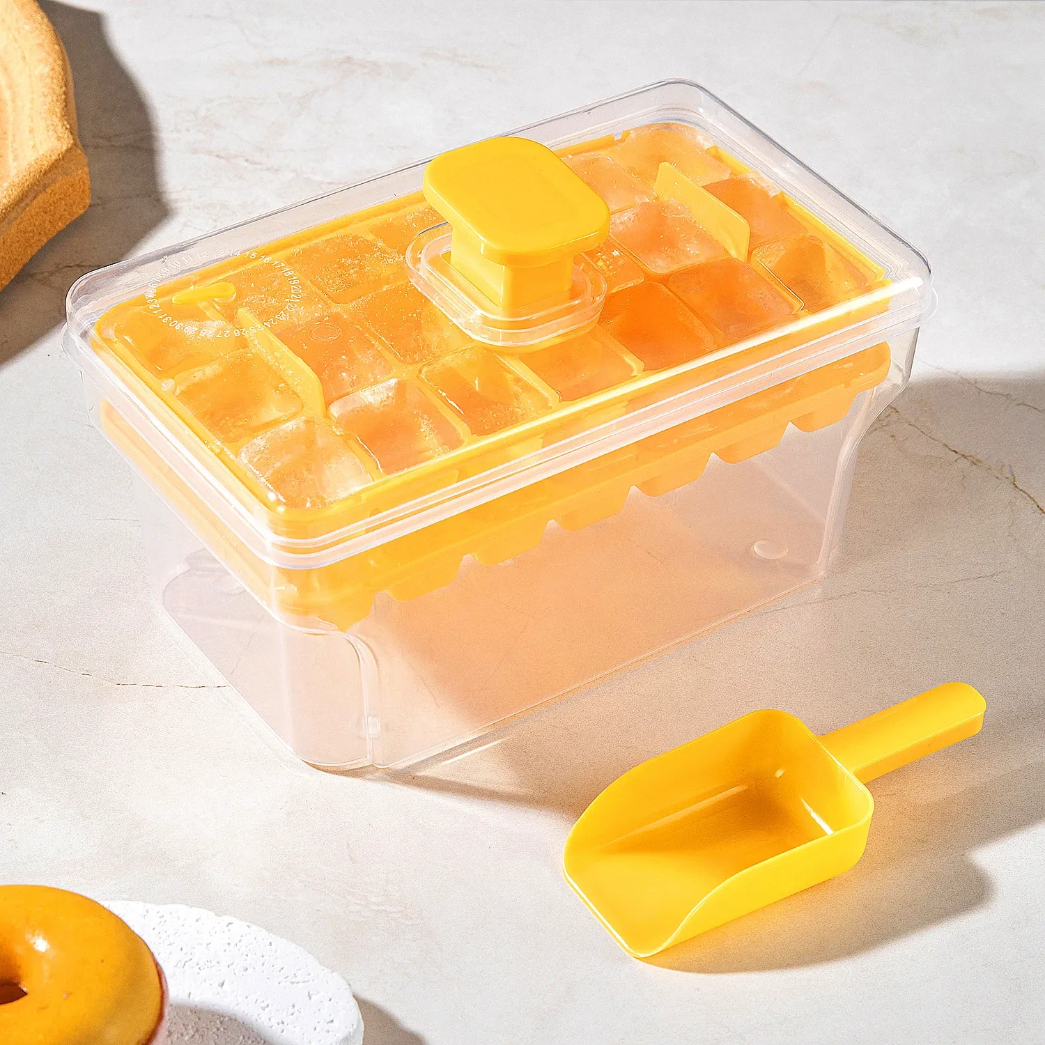 Détail du bac à glace et de son couvercle