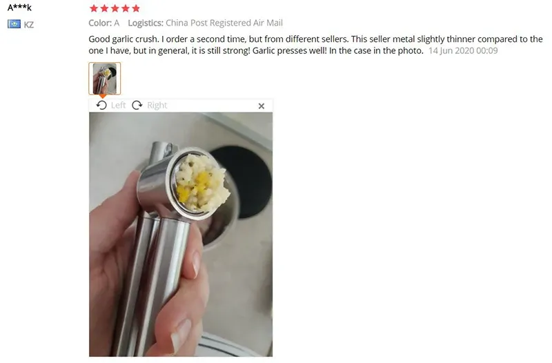 Presse-ail en acier inoxydable en utilisation en cuisine