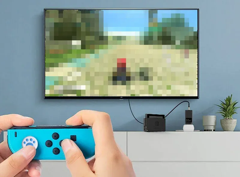 Capuchons de joystick installés sur une manette